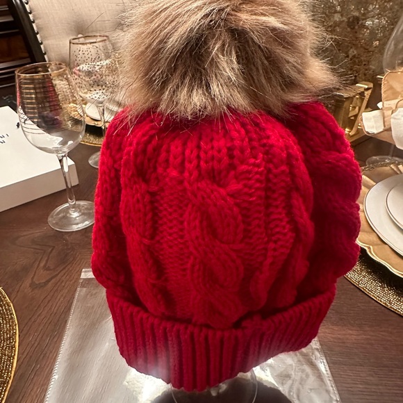 New in packaging. Women’s bright red puff beanie. Make your best offer - Picture 2 of 4